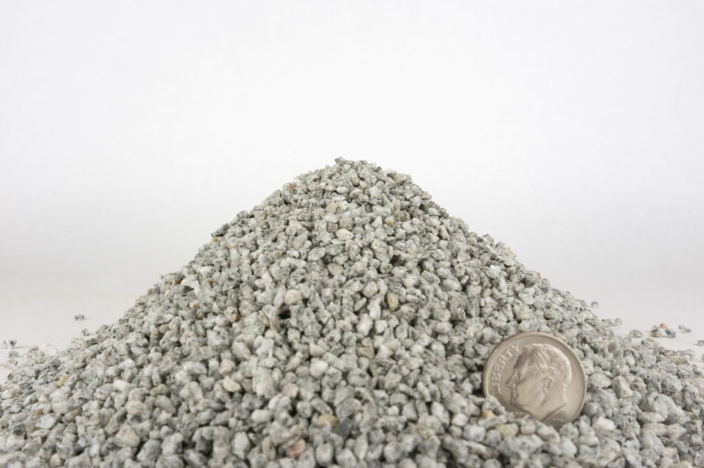 granite grit starter with dime for scale
